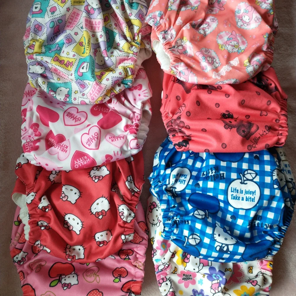 Sunbaby Hello Kitty Sanrio one-size pocket cloth diapers (lot of 8)